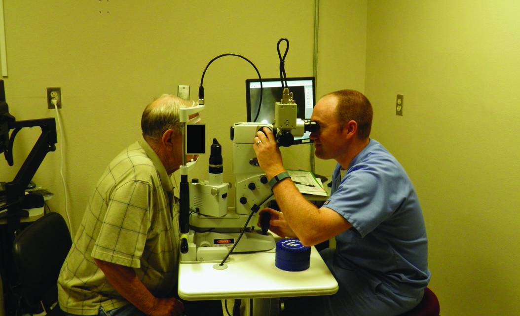 optometrist performing laser in office
