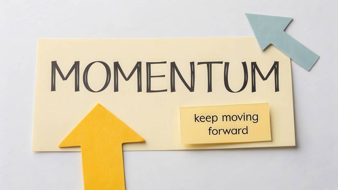 note that says momentum with an upward arrow