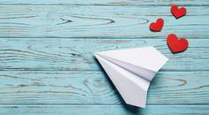 paper airplane with hearts